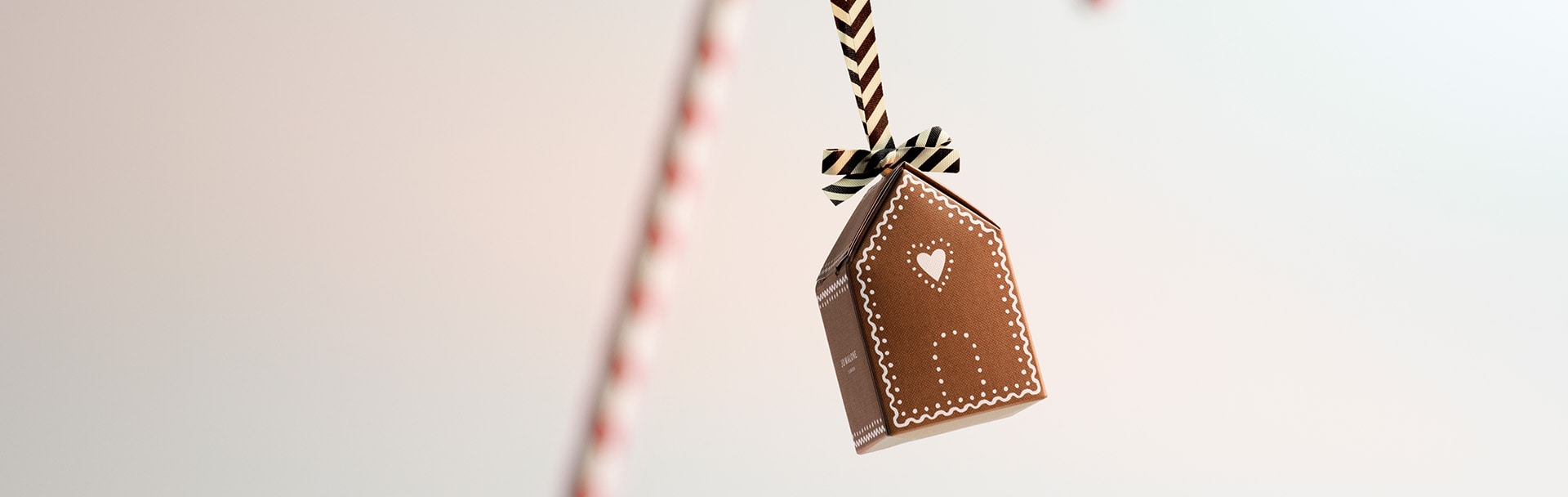 Jo Malone London Christmas ornament on a candy cane digital advent calendar