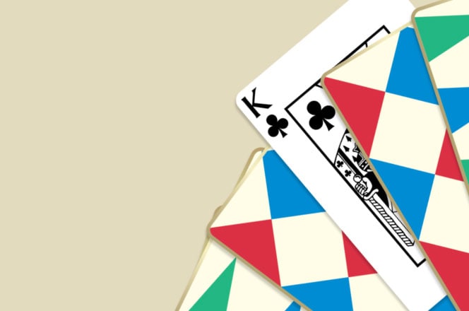 Launch image of advent calendar dartboard box shown open with examples of 5 product contents on checkerboard background.