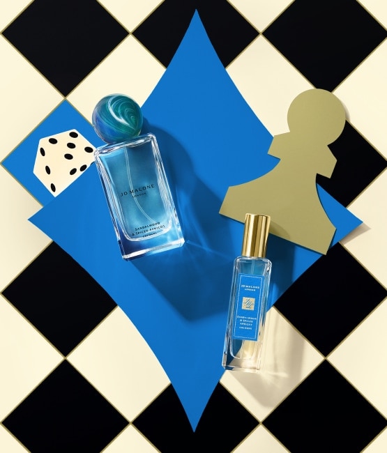 Jo Malone London Sandalwood & Spiced Apricot Colognes 100ml and 30ml on checkered background